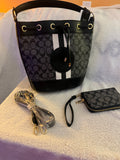 Black monogram bucket bag with matching zip wristlet wallet and adjustable crossbody strap